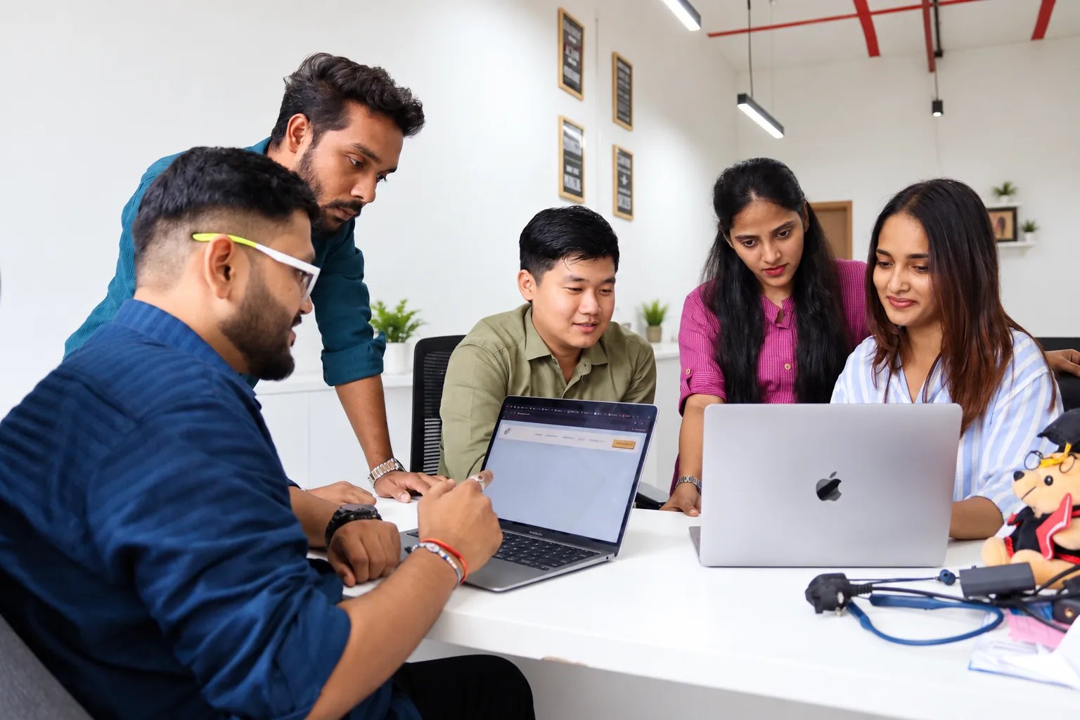 The Hype Marketer team reviewing a client website together